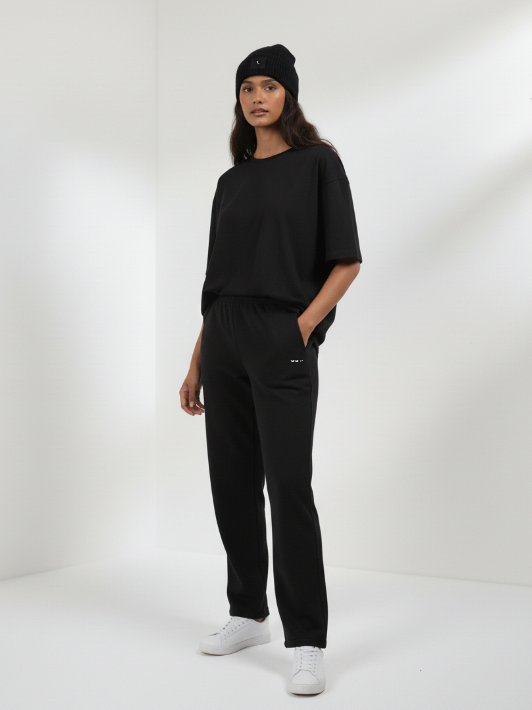 Pantalón de chándal unisex con pernera abierta en algodón orgánico - Negro | shenty
